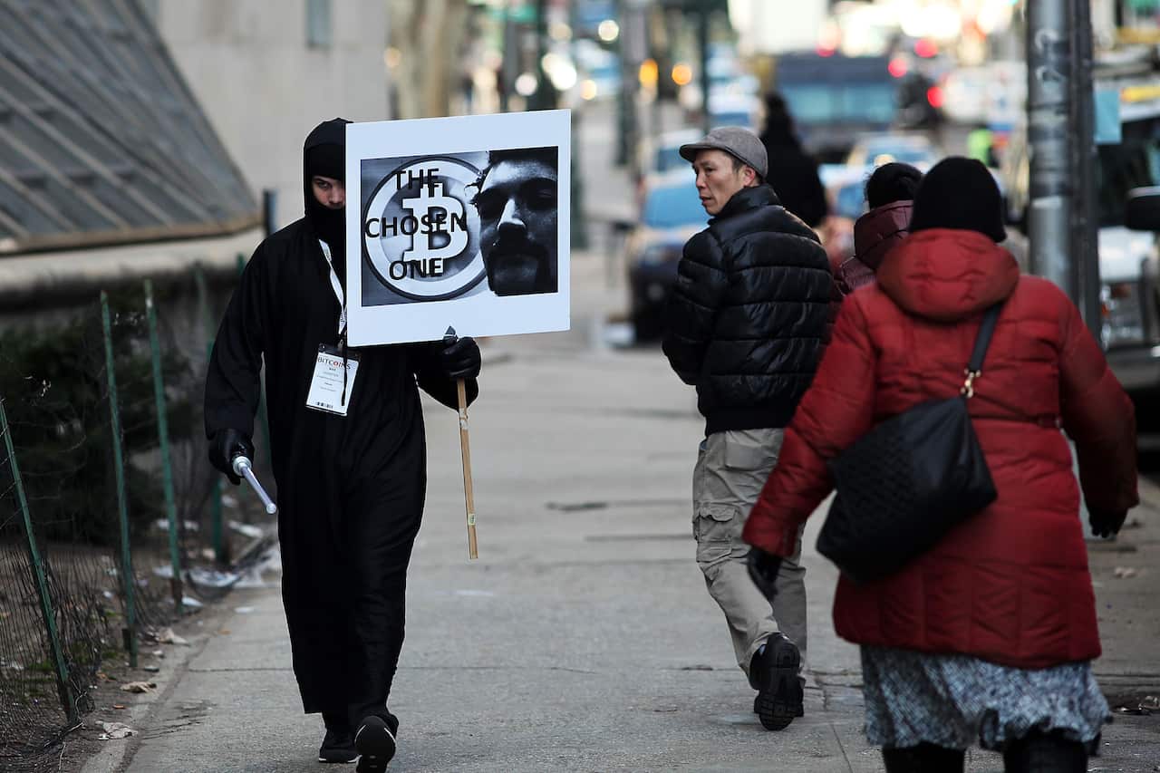 Max Dickstein protests in support of Ross Ulbricht, the alleged creator and operator of the Silk Road, in front of a Manhattan federal court house on the first day of jury selection for his trial.