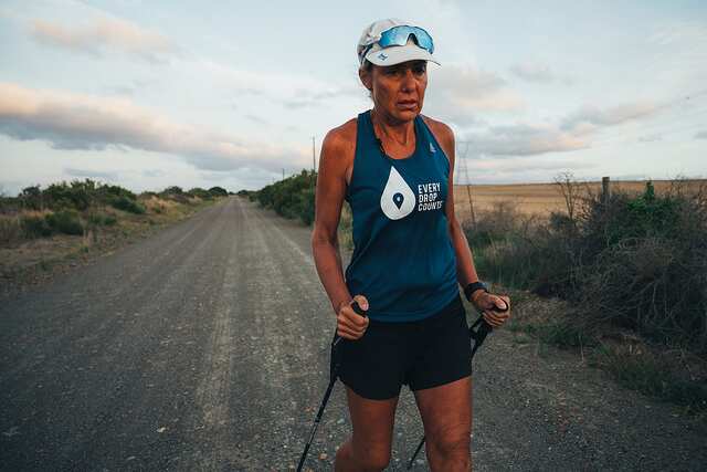 Mina Guli using walking sticks to complete a marathon due to injury between Mossel Bay and Riverdale in South Africa.