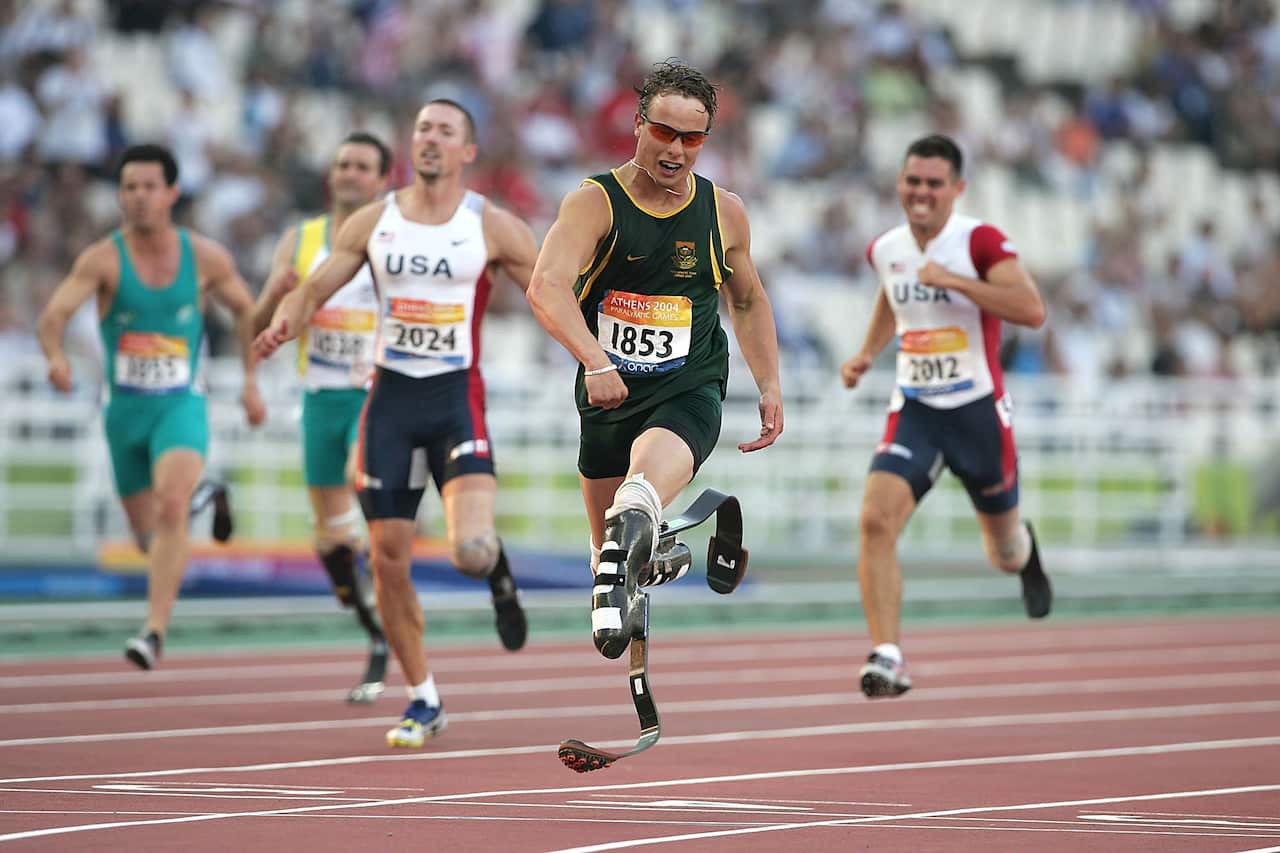 Oscar Pistorius of South Africa wins the 200m at the Athens Paralympic Games, September 21, 2004. (Phil Cole/Getty)
