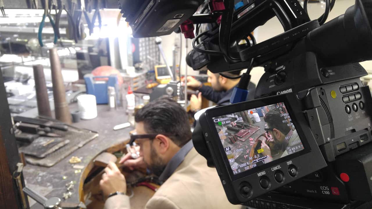 Vartan and Levon base their workstations behind a glass so customers can see exactly how they work. 