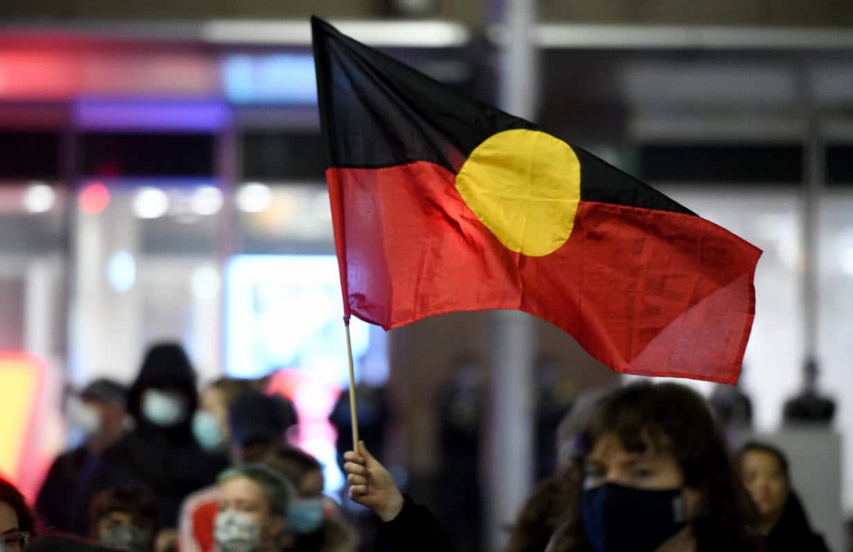 An Aboriginal flag is seen being flown in Sydney