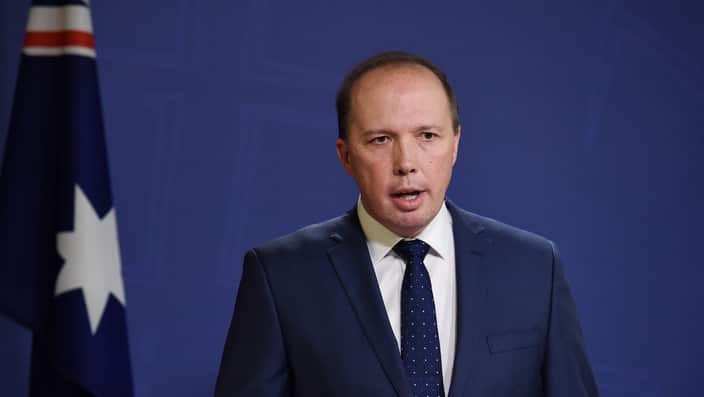Home Affairs Minister Peter Dutton has dismissed reports he may be in breach of the constitution.