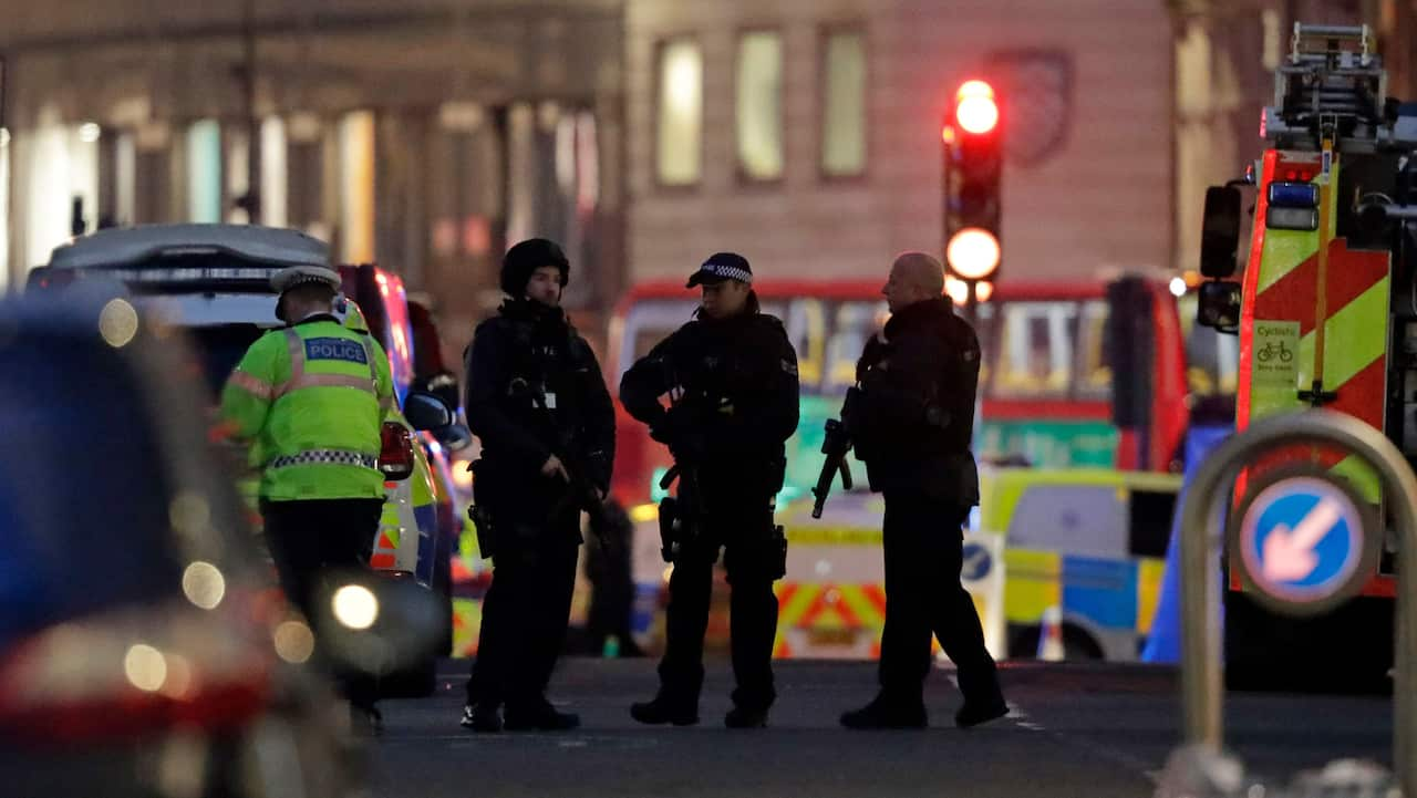 Armed police officers on the north side of London Bridge.