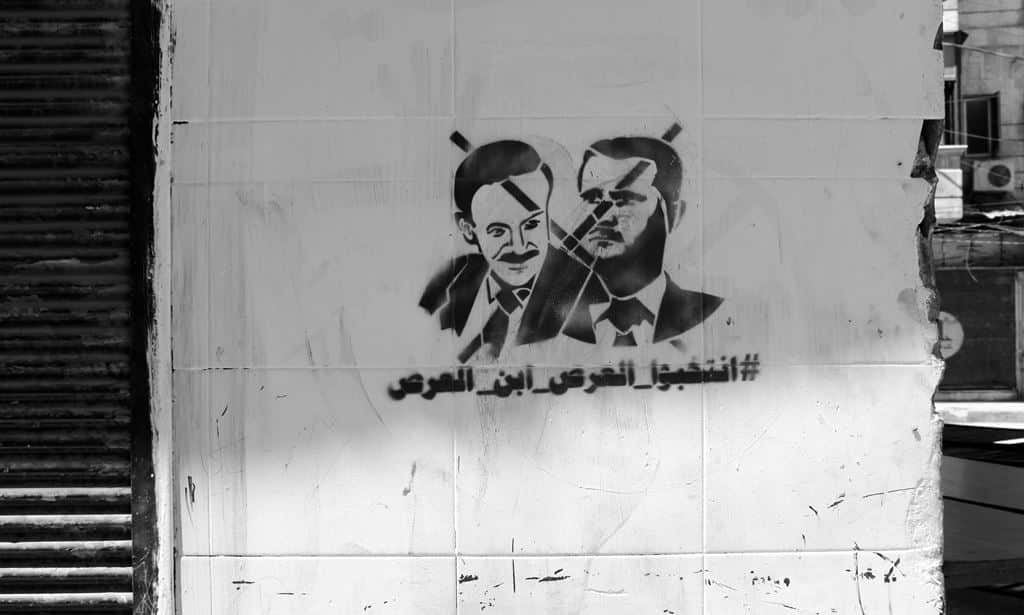Riddled throughout the streets of Aleppo are images of re-elected President, Bashar al-Assad and his father, with a cross through it, signalling the widespread view that the election was a farce. (Photo: Sophie Cousins)
