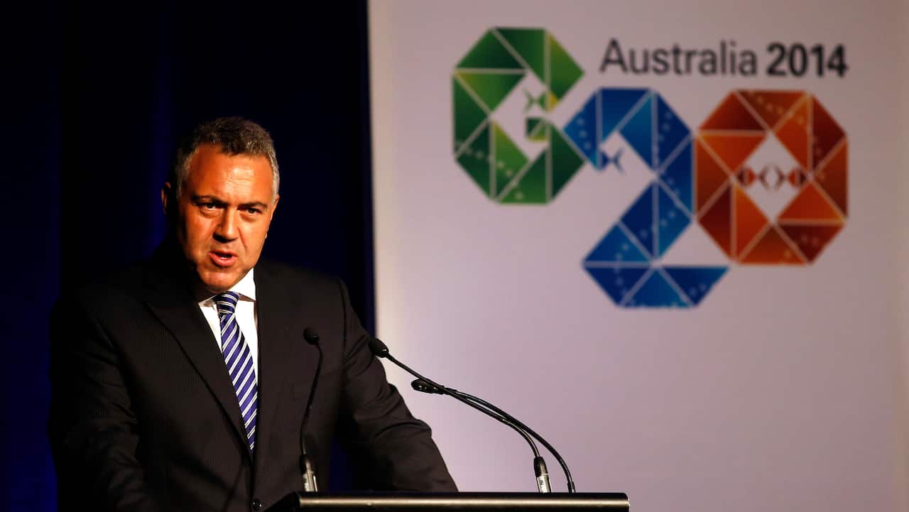 Australian Treasurer Joe Hockey with the G20 logo - AAP-1.jpg