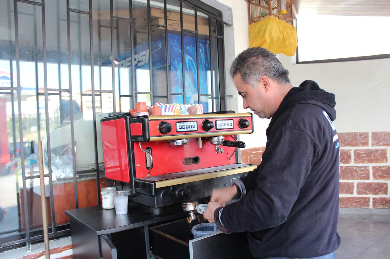 Coffee shop owner Marwan Akil was serving customers when a suicide bomber blew himself up in a passenger van in the southern suburbs of Beirut.