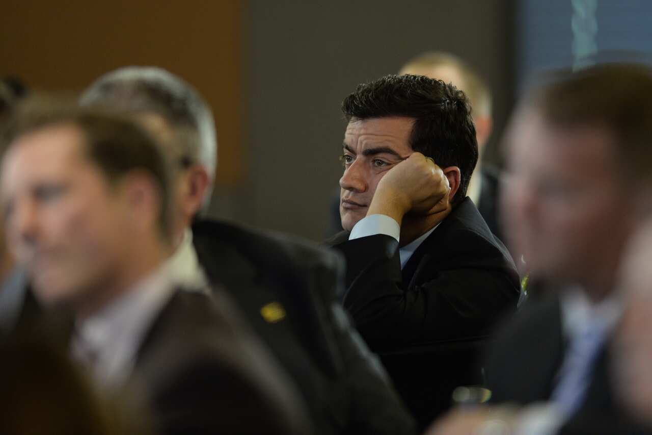 Labor Senator Sam Dastryari listens to National Secretary of the Australian Workers Union Paul Howes address the National Press Club in Canberra Wednesday, February 5, 2014. (AAP)