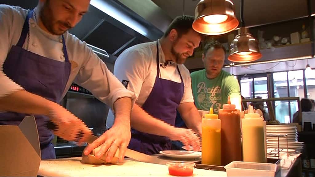 Sebbie Kenyon from Cairns helps to run Frenchie to Go. The former professional rugby player changed paths to cooking after two sports injuries. (SBS)