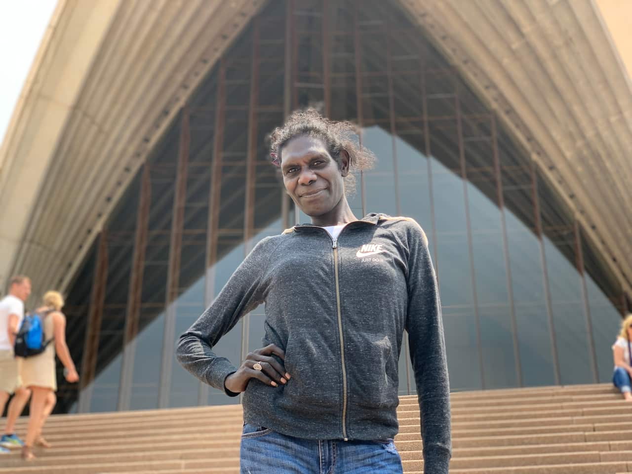 Laura Orsto strikes a pose in front of the Sydney Opera House.