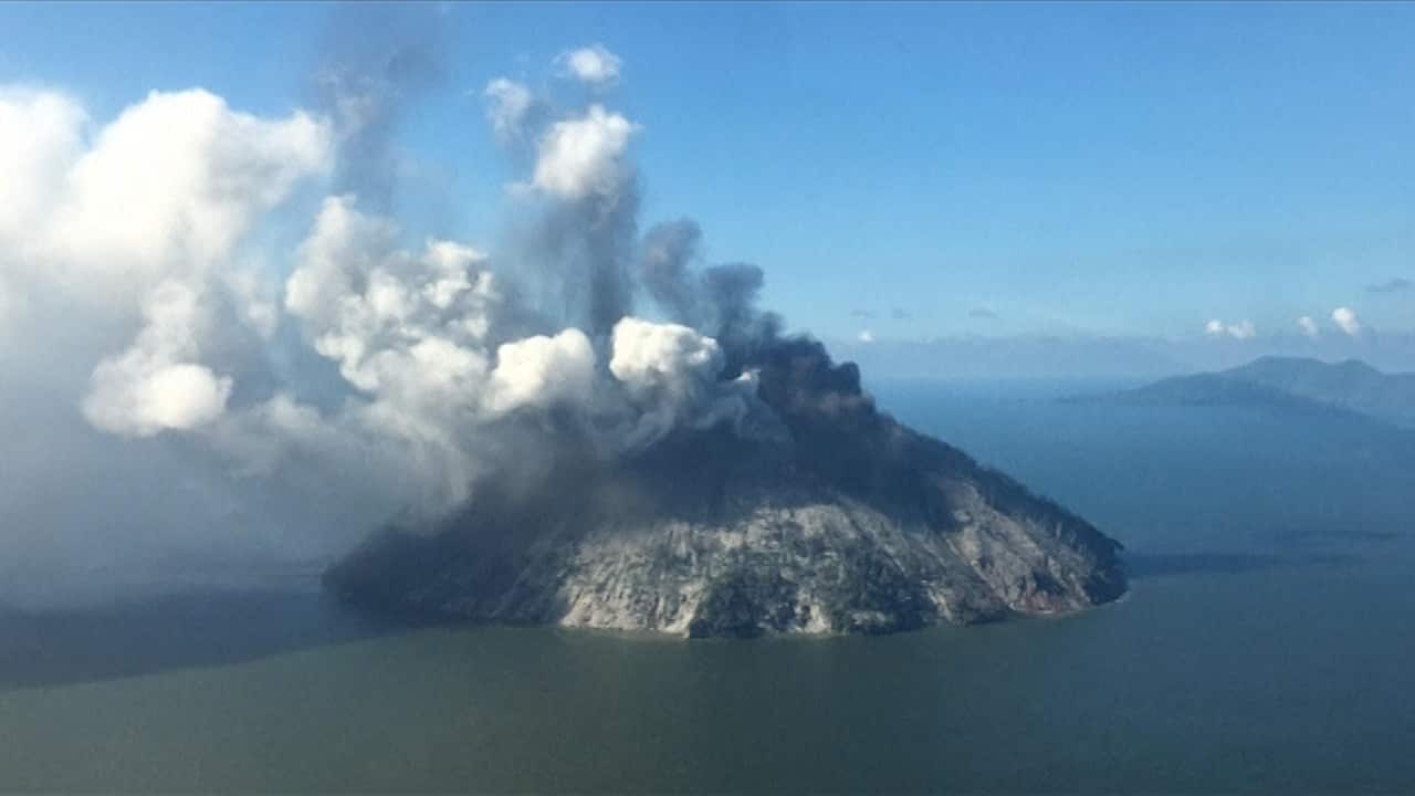 Volcano spews ash on Papua New Guinea island.