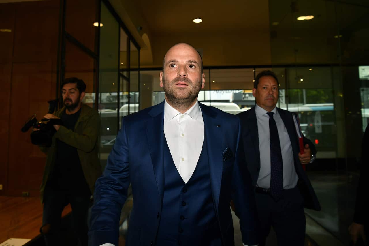 George Calombaris outside Downing Centre Local Court.