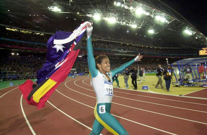 Cathy Freeman again ran a lap of honour carrying the Australian and Aboriginal Flags at the Sydney 2000 Olympic Games, after winning Gold in the Women's 400 meters Finals. 