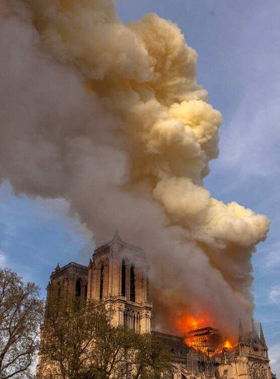 A photo taken on Monday April 15, 2019 shows Notre Dame cathedral burning in Paris (AAP)