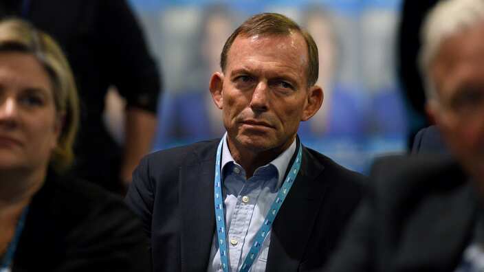 Former prime minister Tony Abbott watches on as Prime Minister Malcolm Turnbull delivers an address at the NSW Liberal Party Futures convention