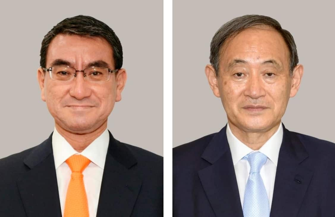 Combined file photo shows Japanese Defense Minister Taro Kono (L) and Chief Cabinet Secretary Yoshihide Suga, who are among the candidates to succeed Abe.