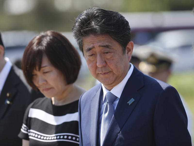 The Japanese leader looks on during the ceremony.