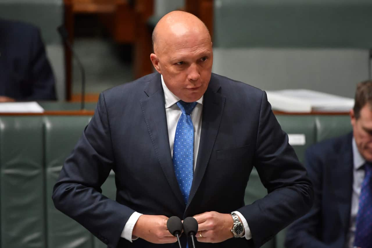 Minister for Home Affairs Peter Dutton during Question Time in the House of Representatives at Parliament House in Canberra, Thursday, December 3, 2020.