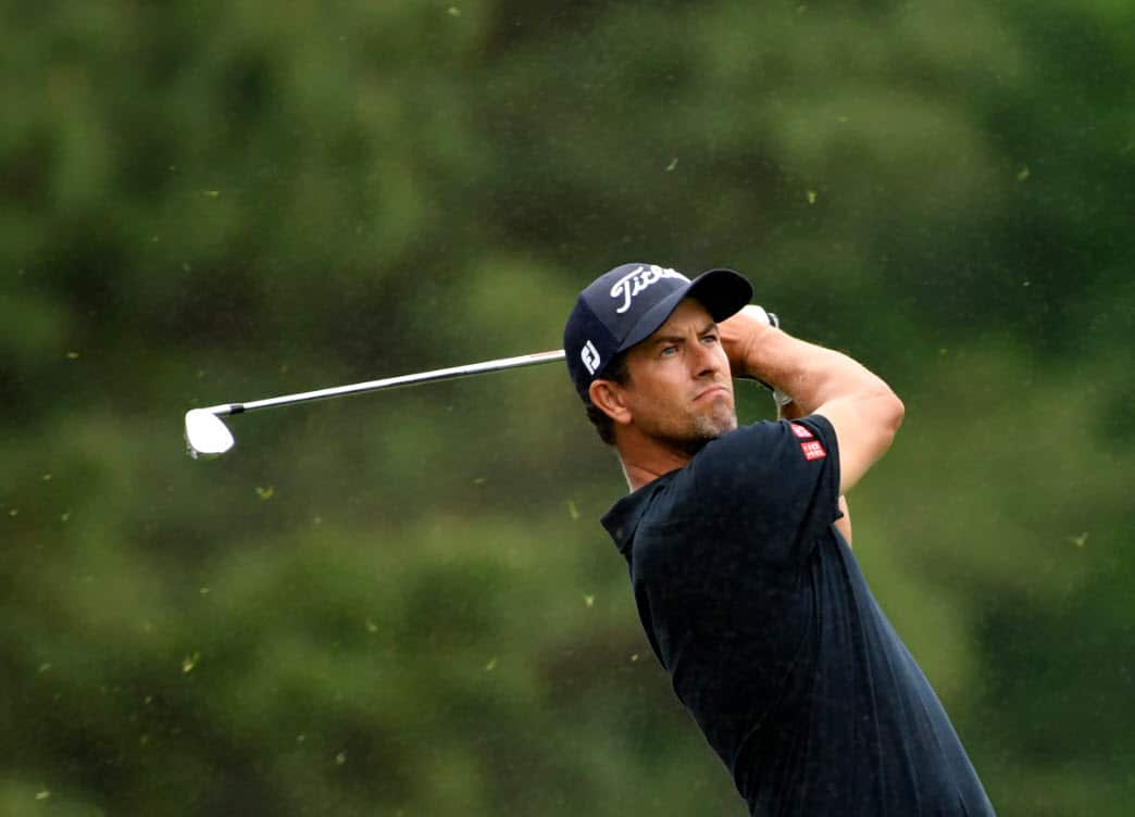 Adam Scott hits his tee shot on the 12th hole during the final round of The Masters golf tournament at Augusta National Golf Club (AAP)