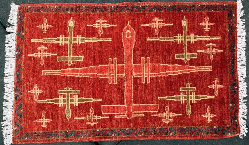 Afghan rug depicting drones