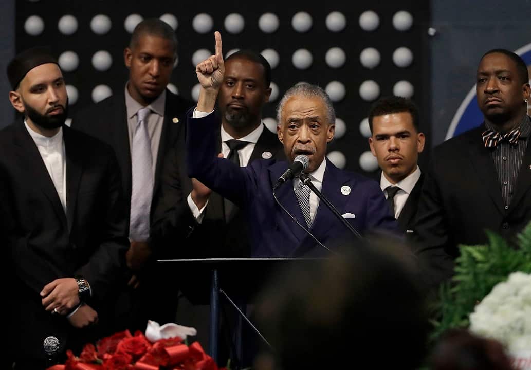The Reverend Al Sharpton, centre, speaks to mourners at Stephon Clark's funeral.