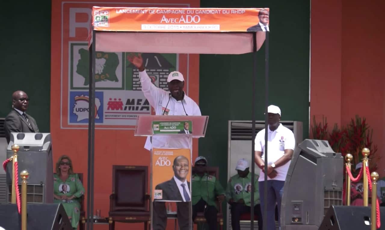 Ivory Coast President Alassane Ouattara waving to supporters in Yamoussoukro