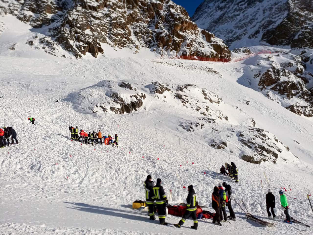 An avalanche killed a woman and a two children who were skiing on a glacier in the Italian Alps.