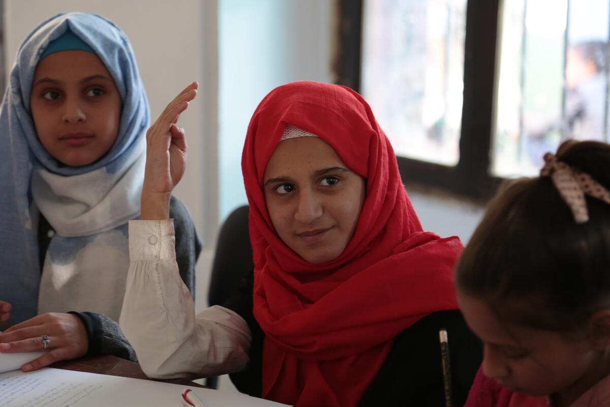 Children at a Child Friendly Space in Sana'a drafting a resolution for the war in Yemen.