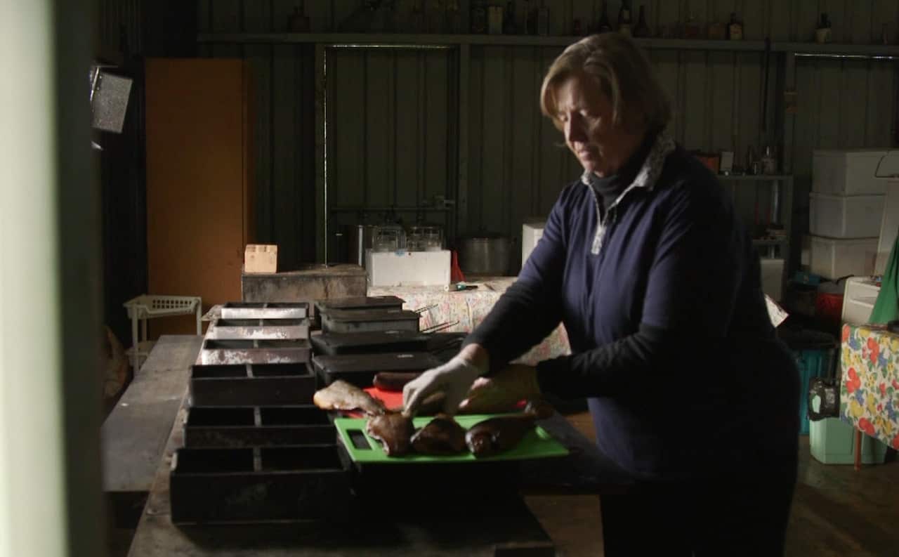 Ann smokes her trout in her shed in in the NSW Riverina