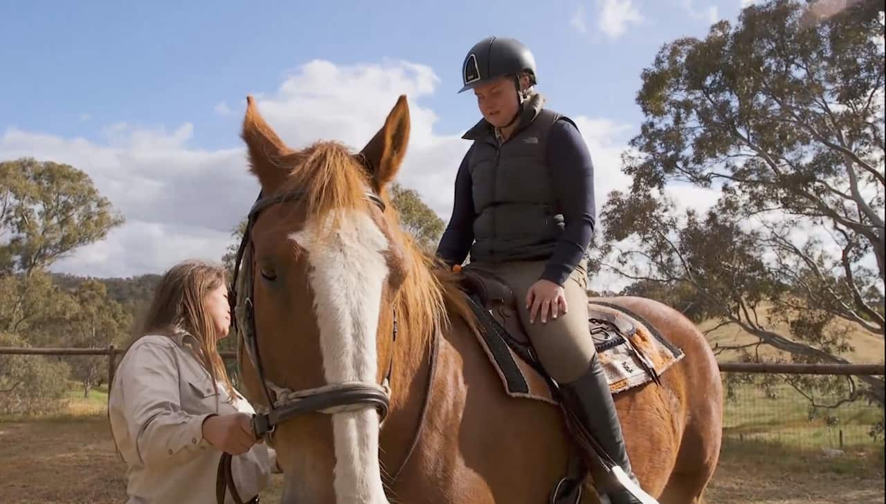 Ara back in the saddle for the first time since her accident.