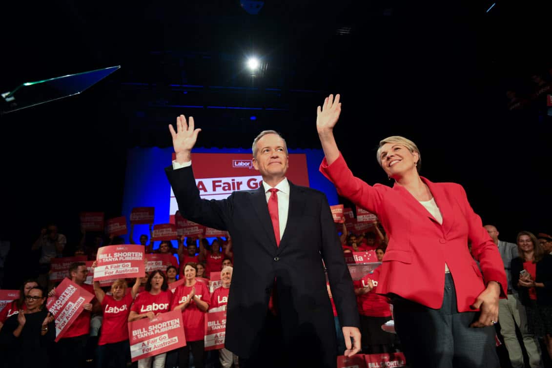 Australian Opposition Leader Bill Shorten and Deputy Leader of the Labor Party Tanya Plibersek react after speaking at a Labor volunteers rally at the Southern Cross Vocational Collegein Sydney (AAP)