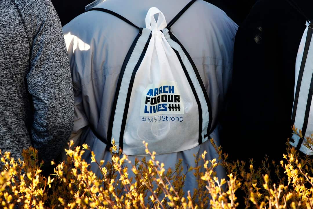 A student from Marjory Stoneman Douglas High School attends a news conference about gun violence.