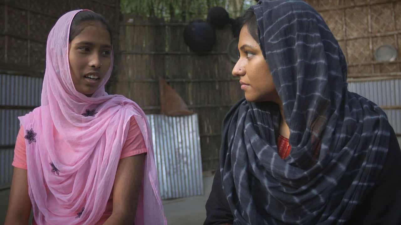 Ashfia (left) tells Tania that her mother wanted to marry her off at 13, but she too resisted and is continuing to study instead.