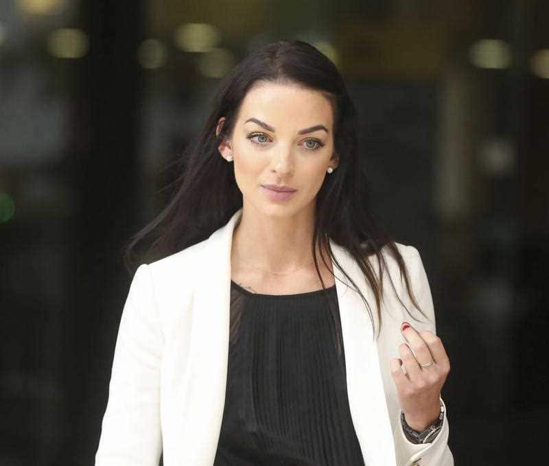 The former Auburn deputy mayor was found guilty of assault after slamming a car door on the arm of Seven Network reporter Laura Banks.