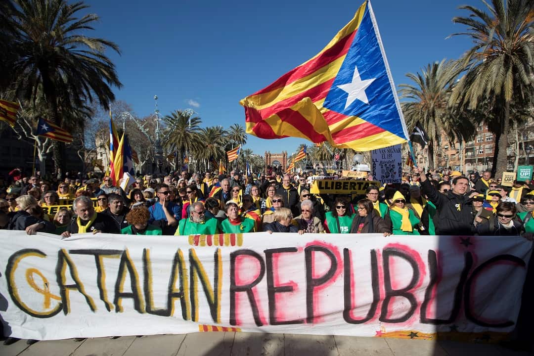 Hundreds gather at the park of the Ciudadela in Barcelona to watch the constituent session of the Catalan Parliament.