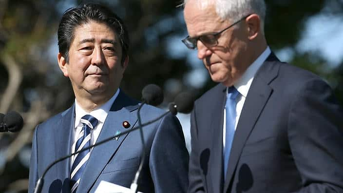 Japan's prime minister Shinzo Abe (left) looks at Malcolm Turnbull during a press conference at Kirribilli House in Sydney in Jan 2017