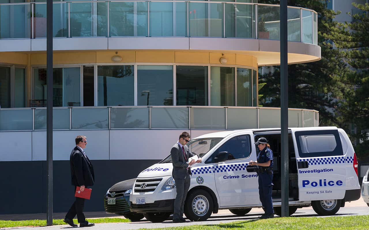 Crime Scene Investigators arrive at Glenelg during a press conference held by Holdfast Shores Lord Mayor Stephen Patterson after the drowning of a teenage girl.