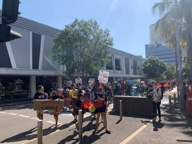 Protesters gathered peacefully to march through Darwin's CBD.