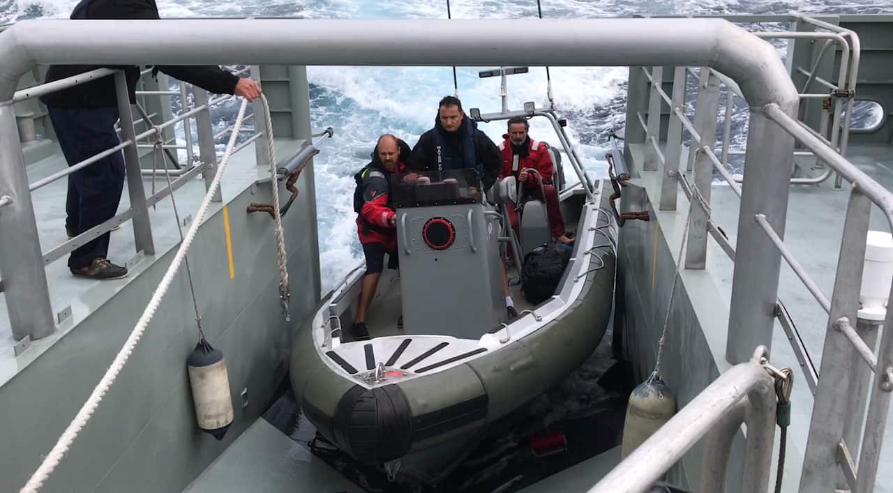 A supplied screen-grab from a video footage obtained Wednesday, March 8, 2017 of an Irishman and Frenchwoman being rescued (AAP)