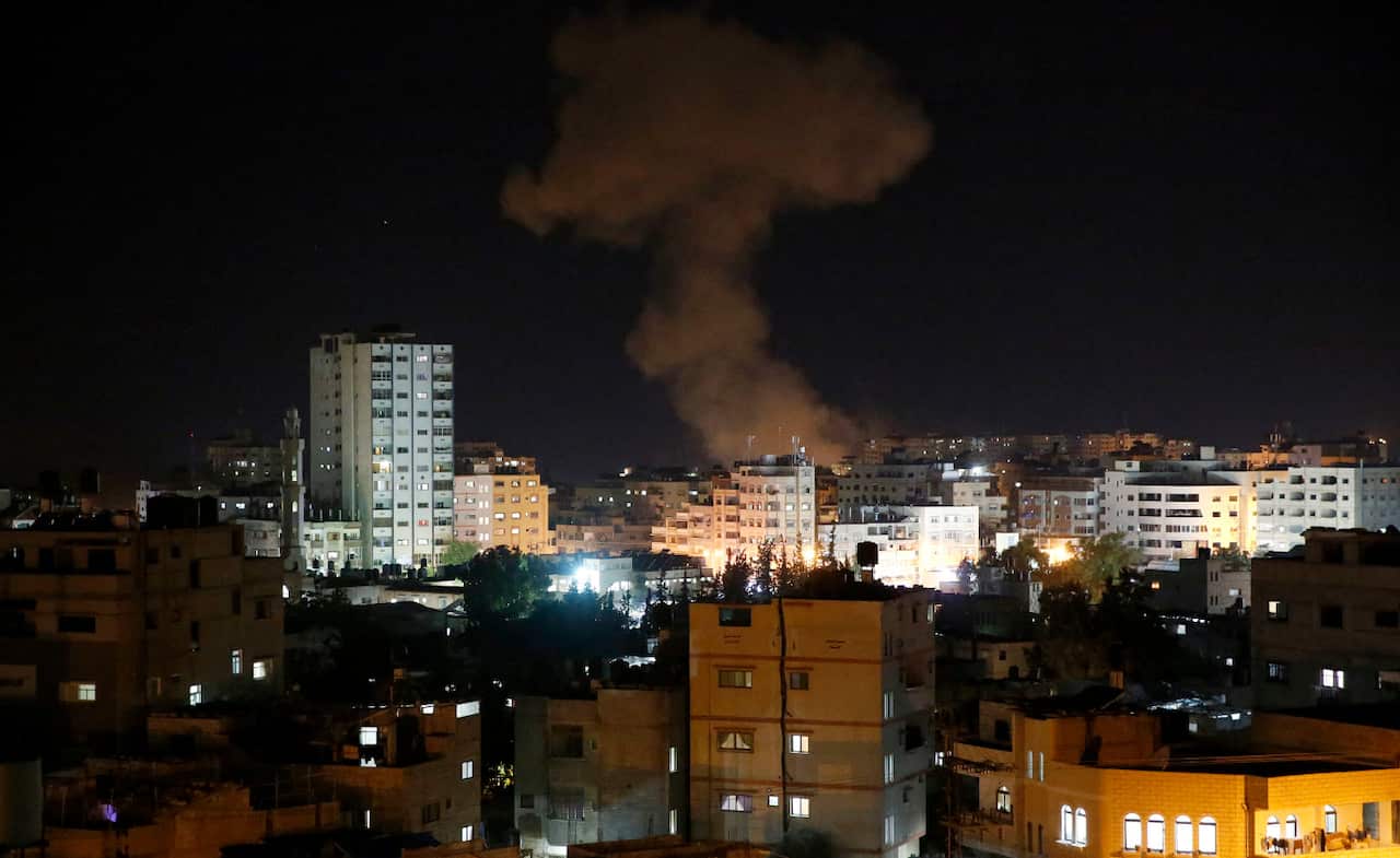 Smoke rises following Israeli strikes on Gaza City, Monday, Nov. 12, 2018.