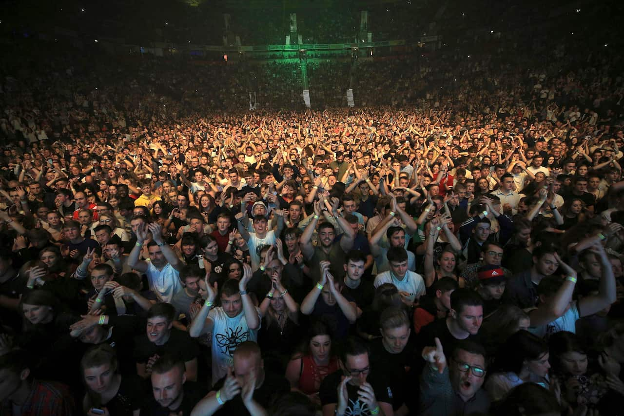 The crowd cheer during the 'We Are Manchester' benefit show following the re-opening of the Manchester Arena in 2017.