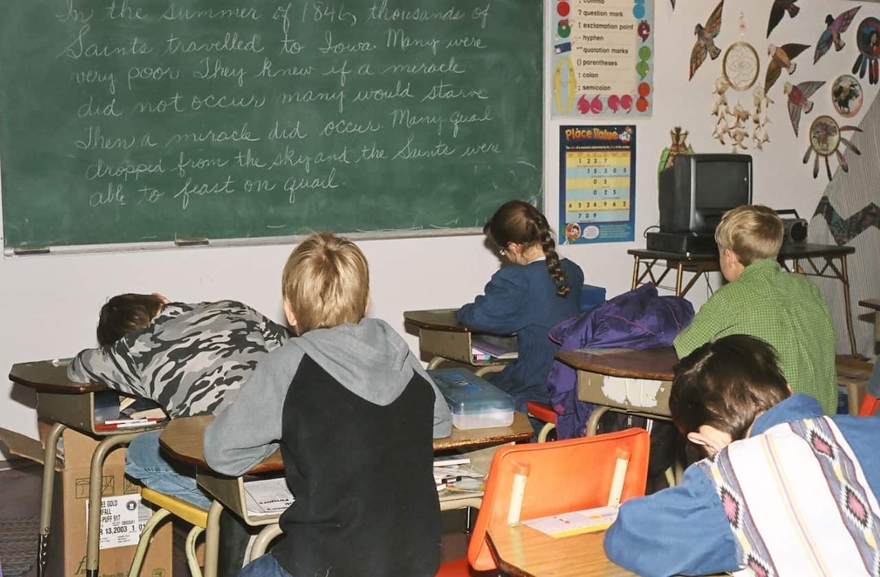 File image of students attending class at a school for followers of polygamist Winston Blackmore in Bountiful, Canada, Nov. 23, 2005. 