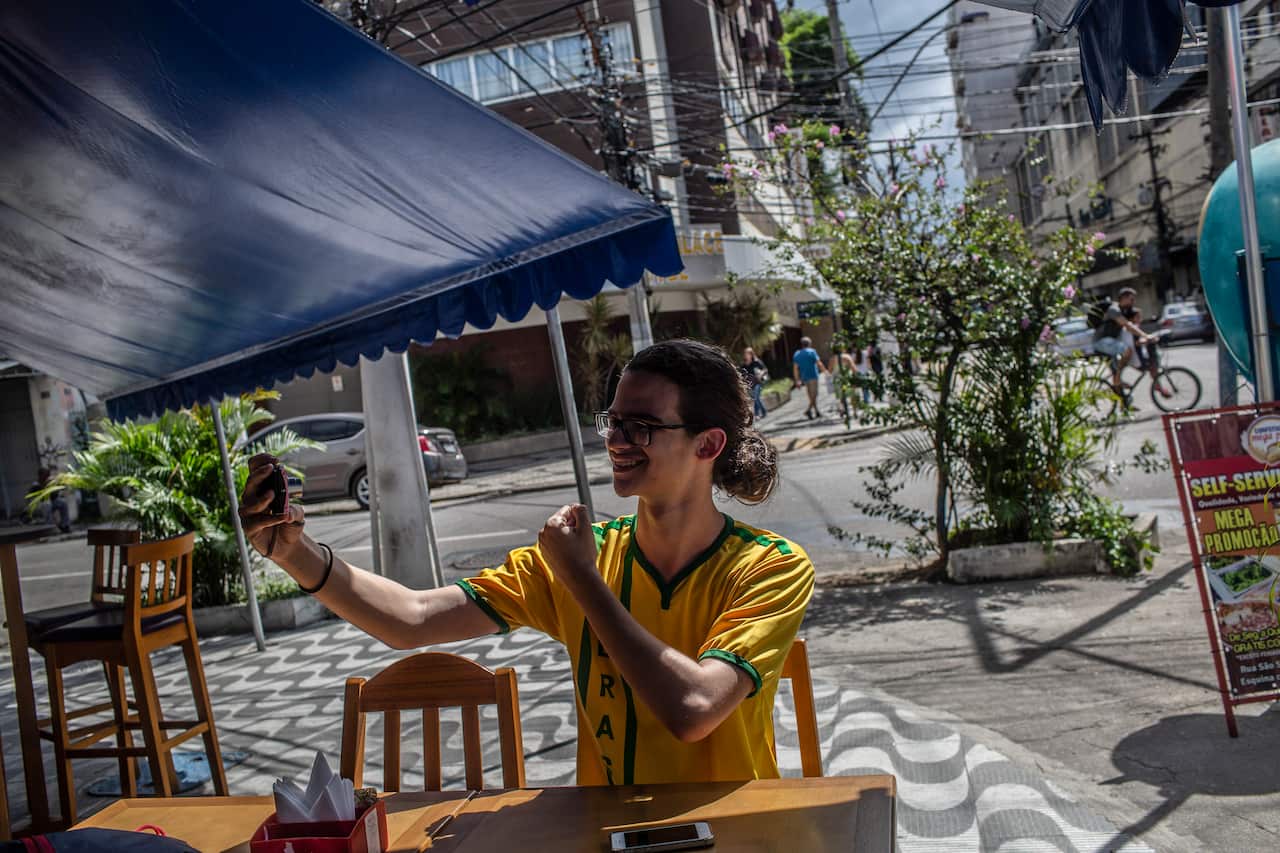 Matheus Dominguez, who said YouTube was crucial to shifting his political views to the far right, recording a YouTube video in Niteri, Brazil, April 29, 2019. (Dado Galdieri/The New York Times)