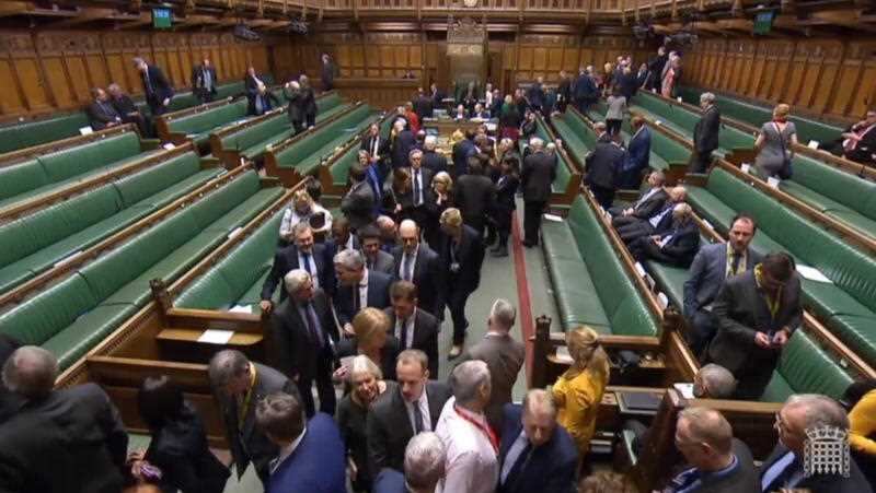 MPs clearing the floor after a division to vote on the amendment, in Westminster.