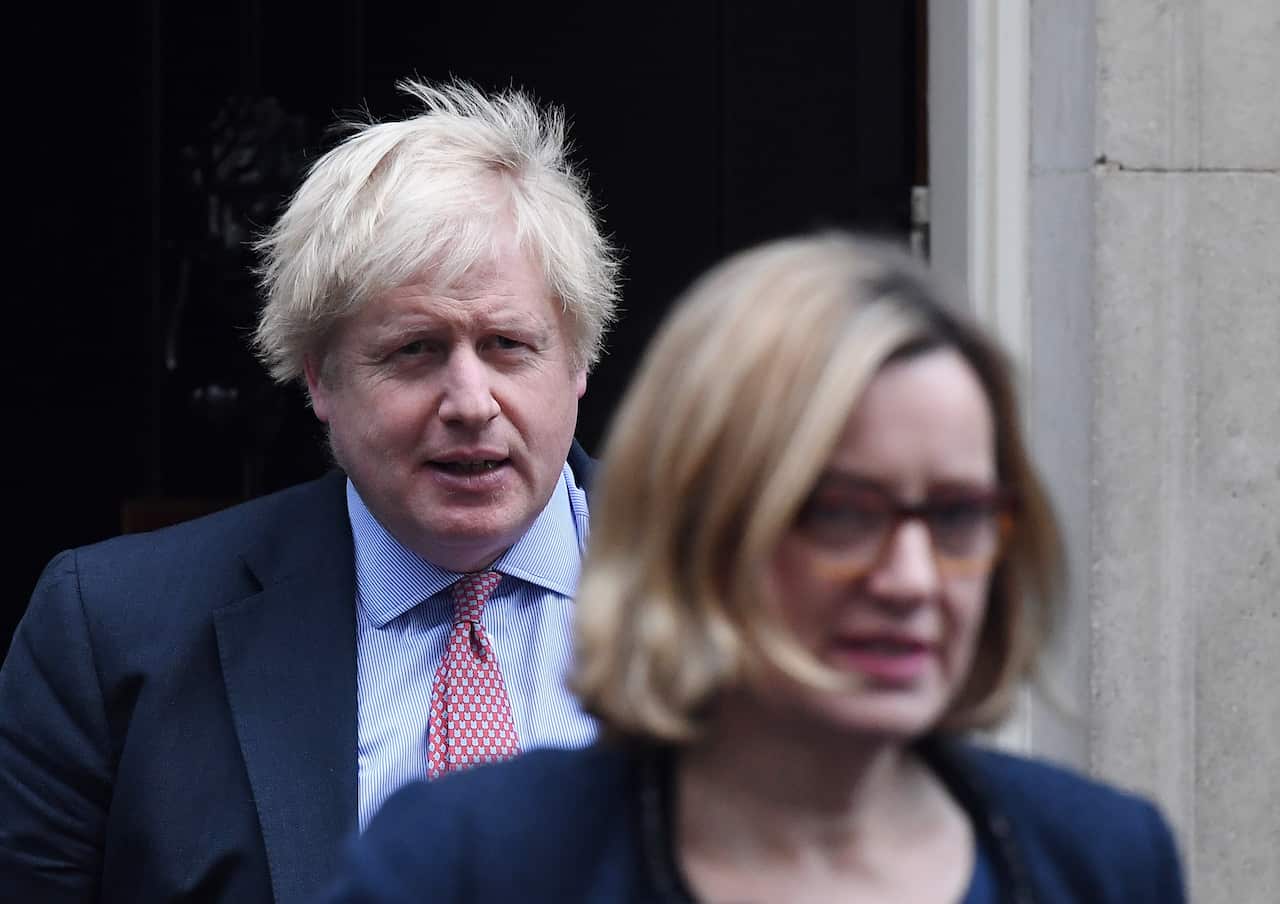 Amber Rudd (flanked by Prime Minister Boris Johnson) sensationally quit Mr Johnson’s cabinet over the Brexit saga.