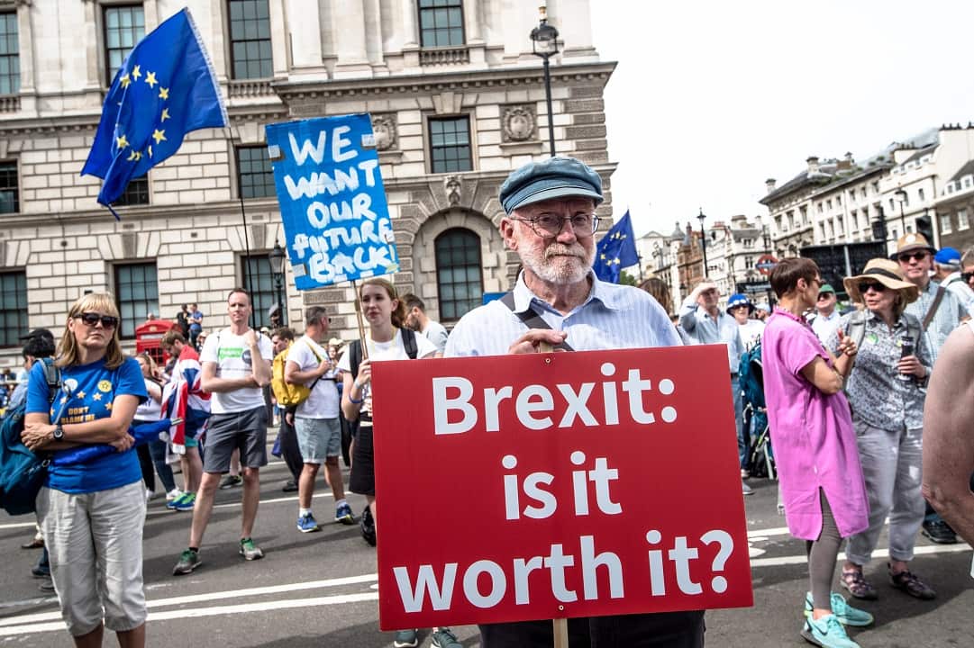 A sign reading "Brexit: Is it worth it?" at the demonstration against Brexit.