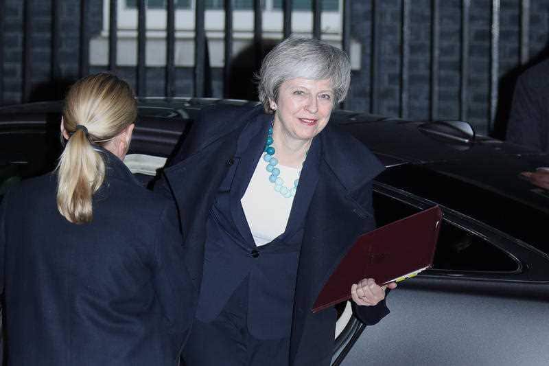 Prime Minister Theresa May arrives back at 10 Downing Street.