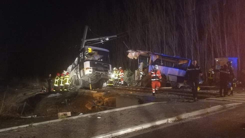 A handout photo made available by France Bleu Roussillon shows Emergency personnel at the crash site of a school bus