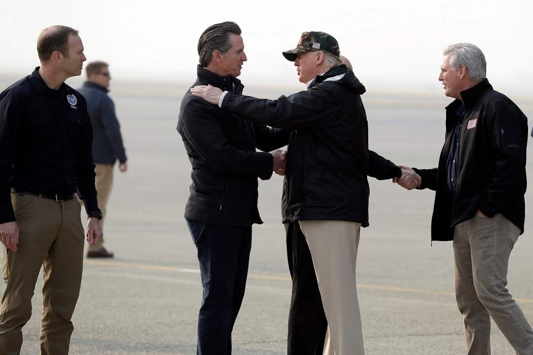 President Donald Trump arrives at Beale Air Force Base for a visit to areas impacted by the wildfires.
