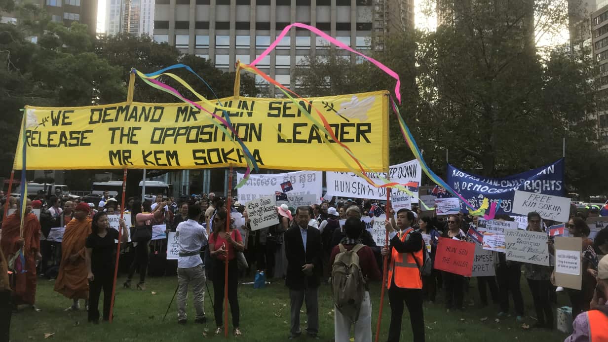 Protesters held signs calling Hun Sen a "killer" and demanding the release of the Opposition Leader.
