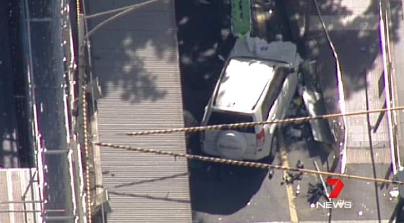 An aerial photo of a crashed car in Melbourne after more than a dozen pedestrians were hit.